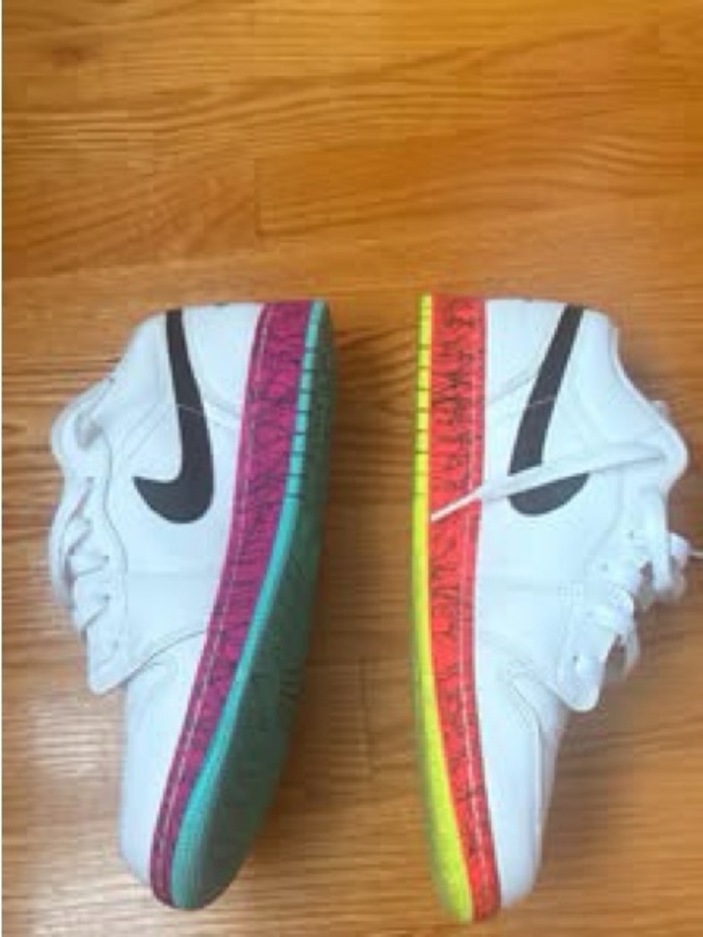 Nike Kids White Sneakers with Black Swoosh and Multicolor Soles